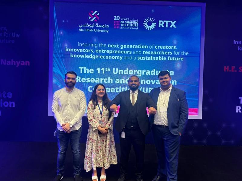 The 11th URIC organizer team with the event emcee.