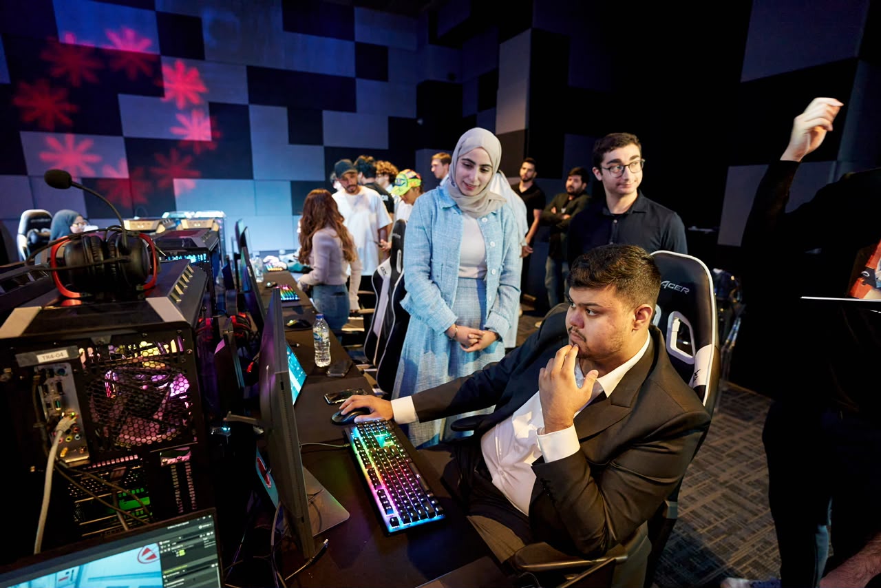 Playing the game at the end-of-cohort showcase.